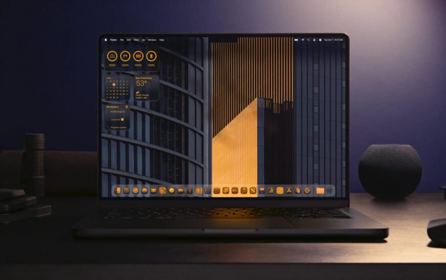 La main MacOS d’Apple MacOS Tahoe axes à la main de Mickey Mouse